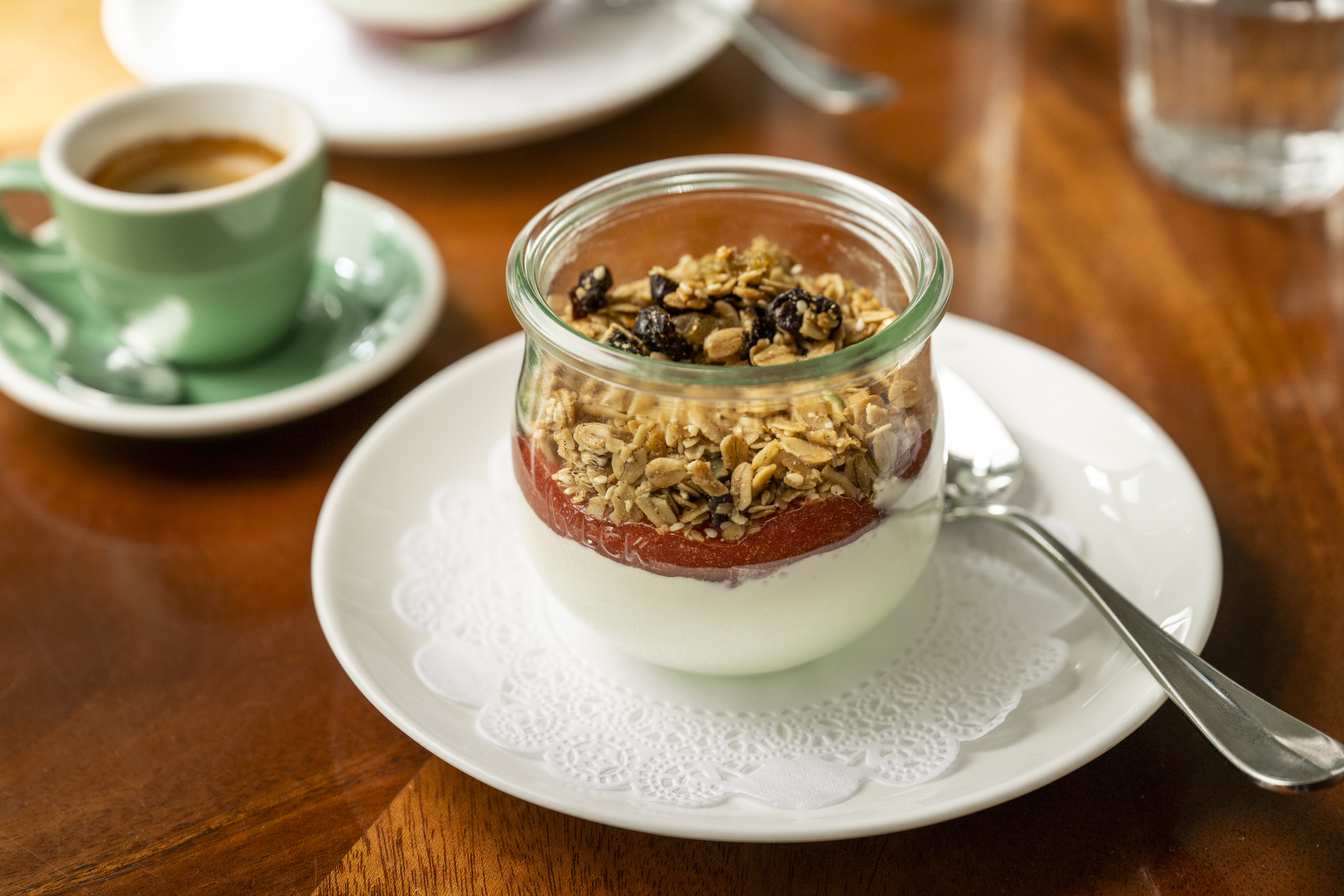 a plate of food and a cup of coffee