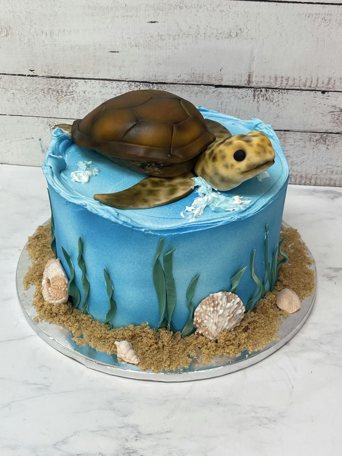 a cake with a blue decorations