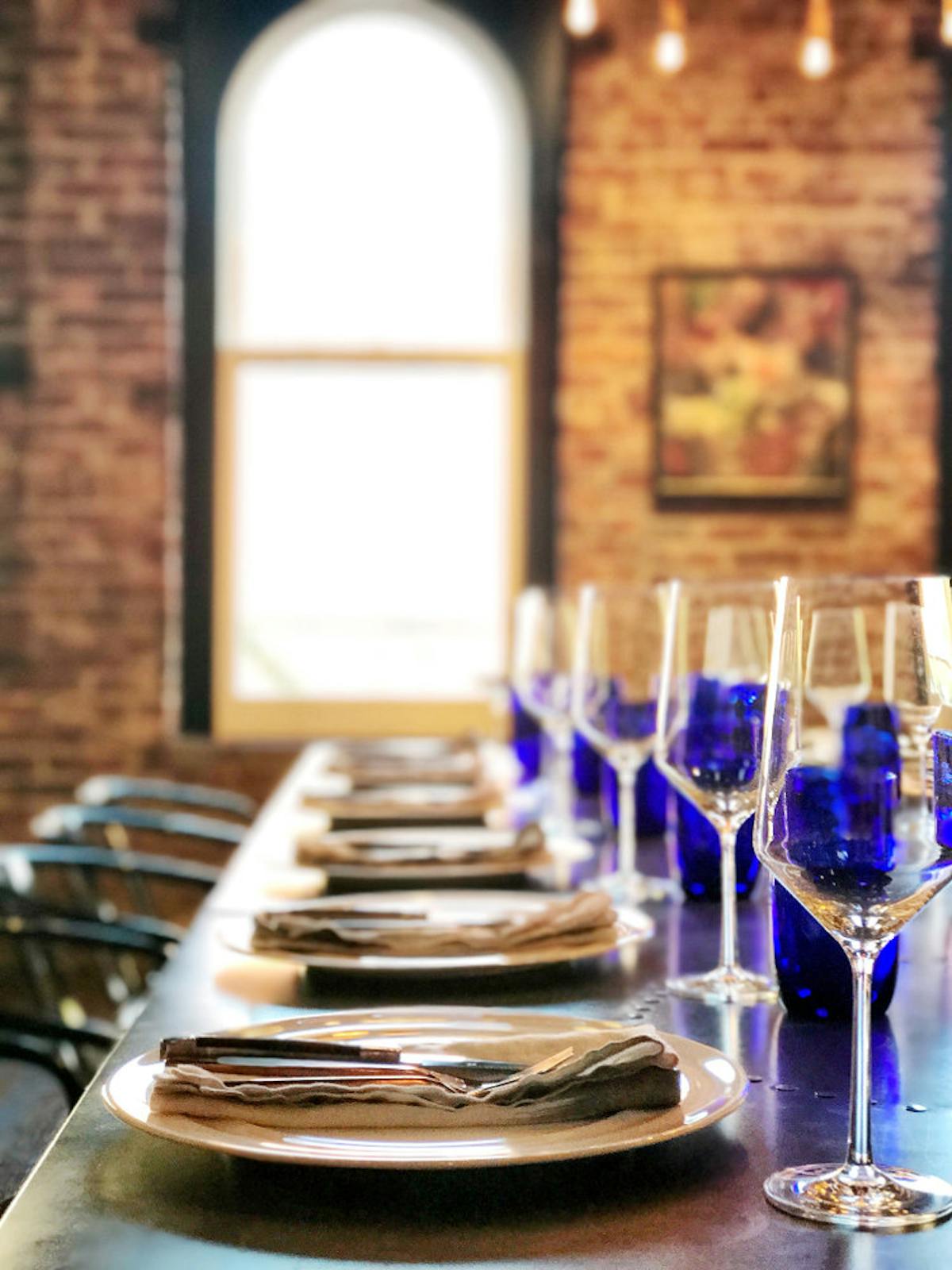 a glass of wine on a table