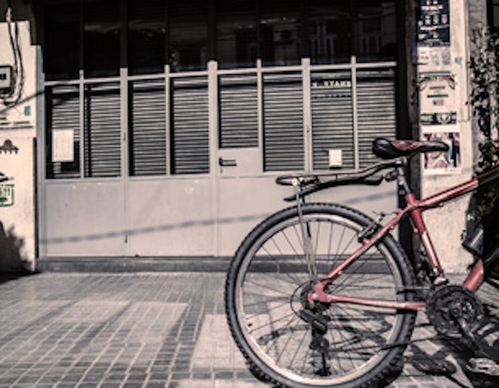 a bicycle parked in front of a building