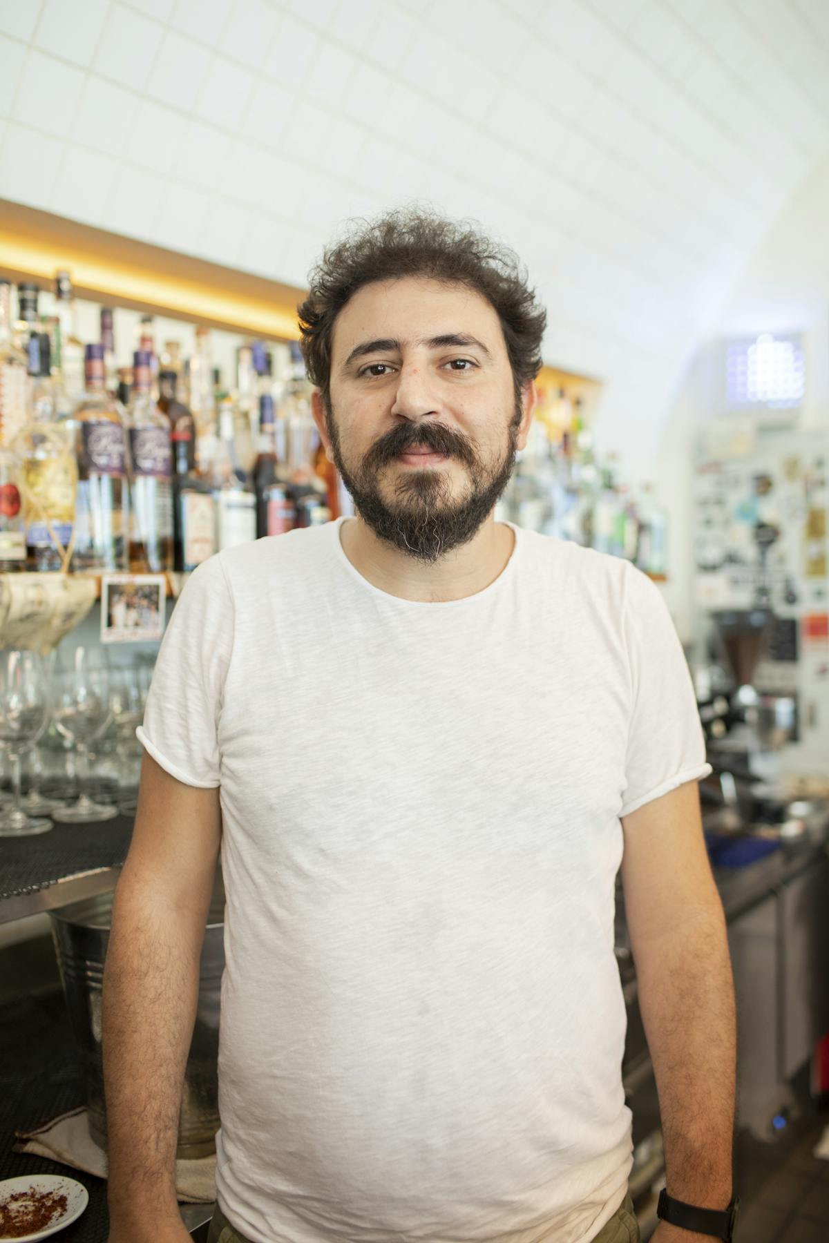 a man standing in a kitchen
