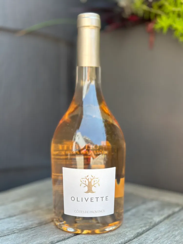 a bottle of wine on a table