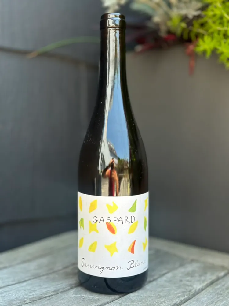 a bottle of wine on a table