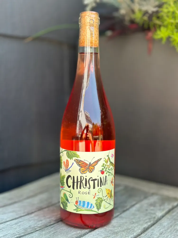 a bottle of wine on a table
