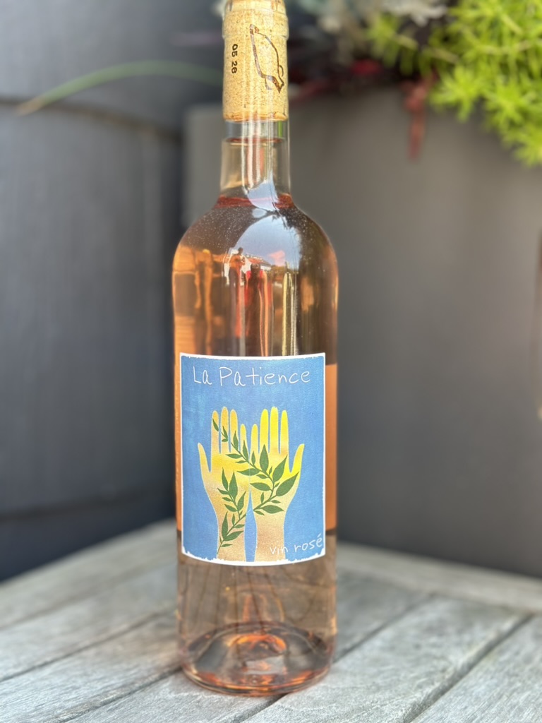 a bottle of liquid on a table