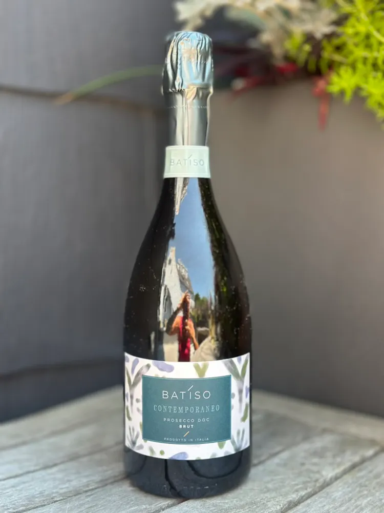 a bottle of wine on a table