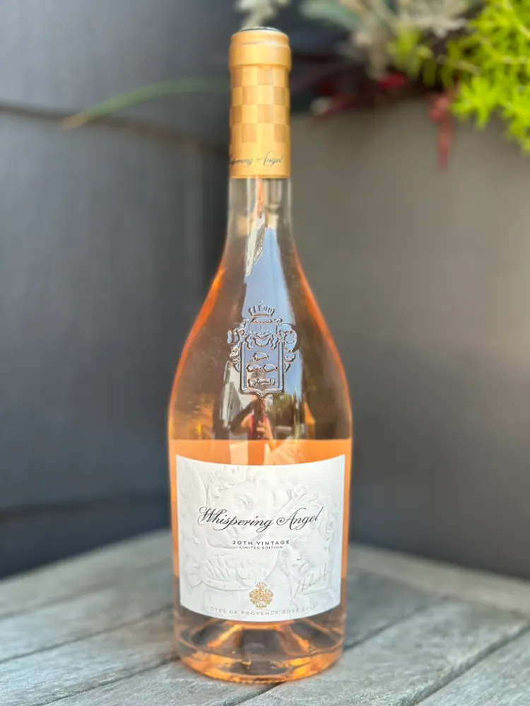 a bottle of wine on a table