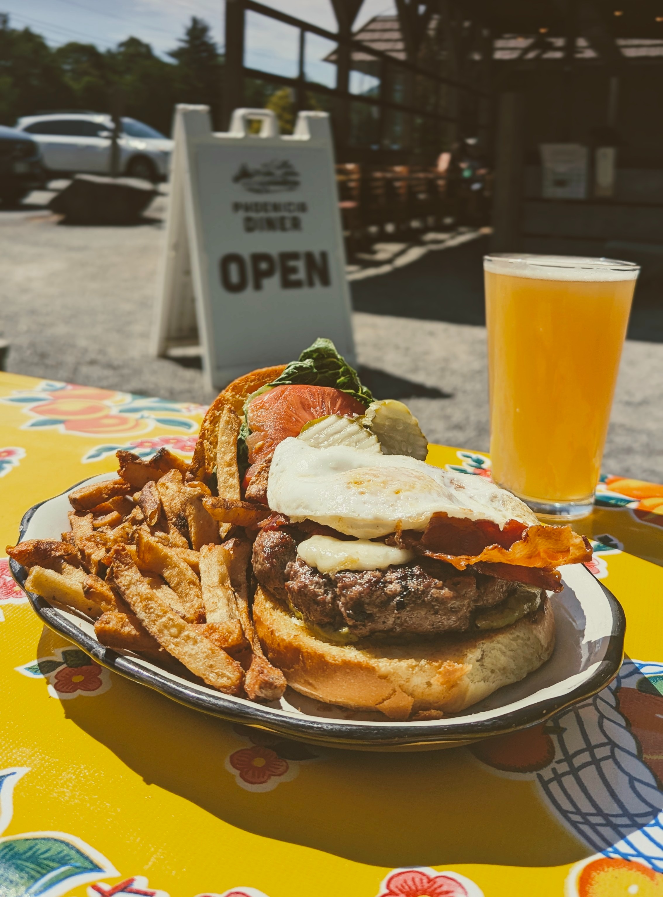 a plate of food and a drink on a table