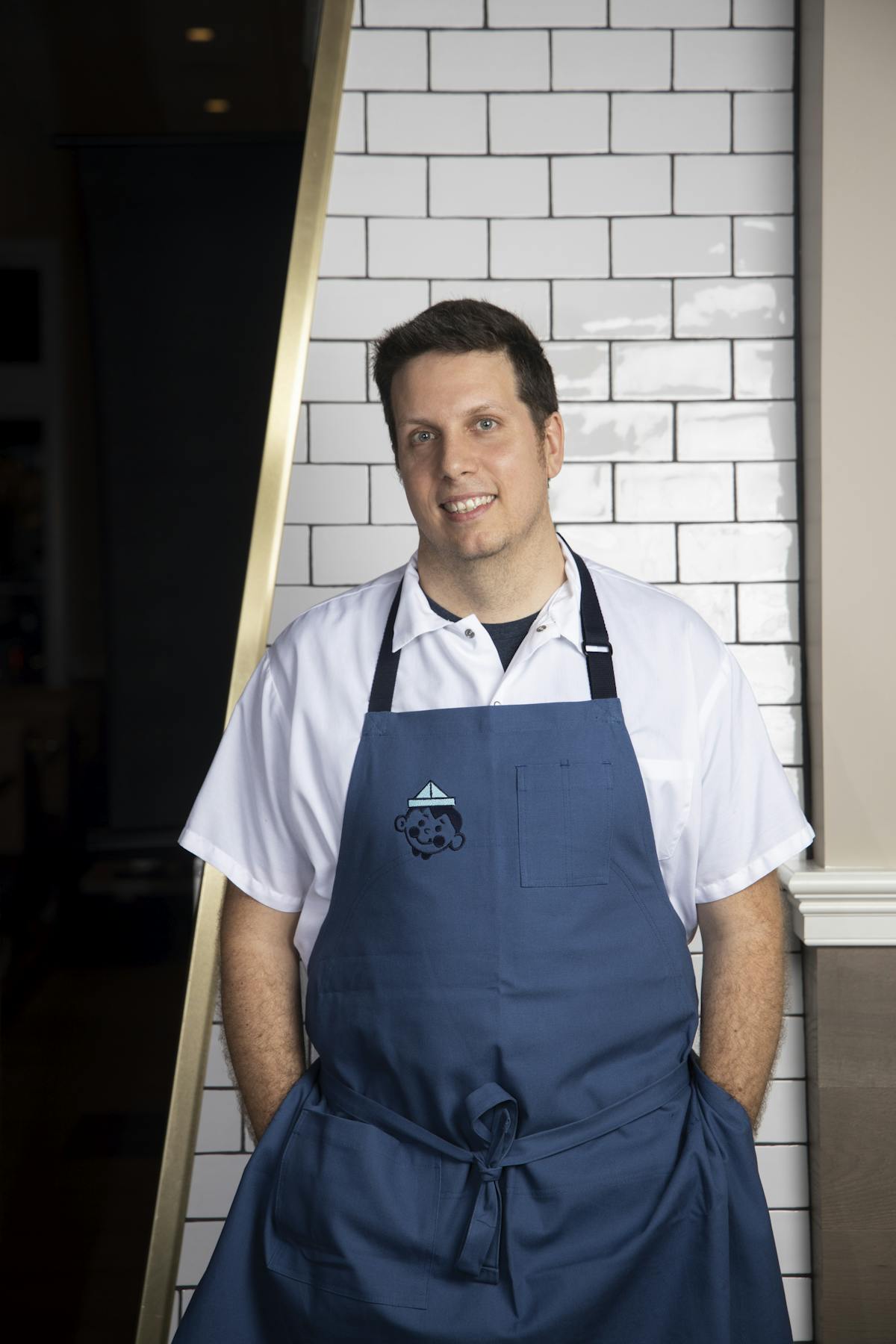 a man in a blue shirt