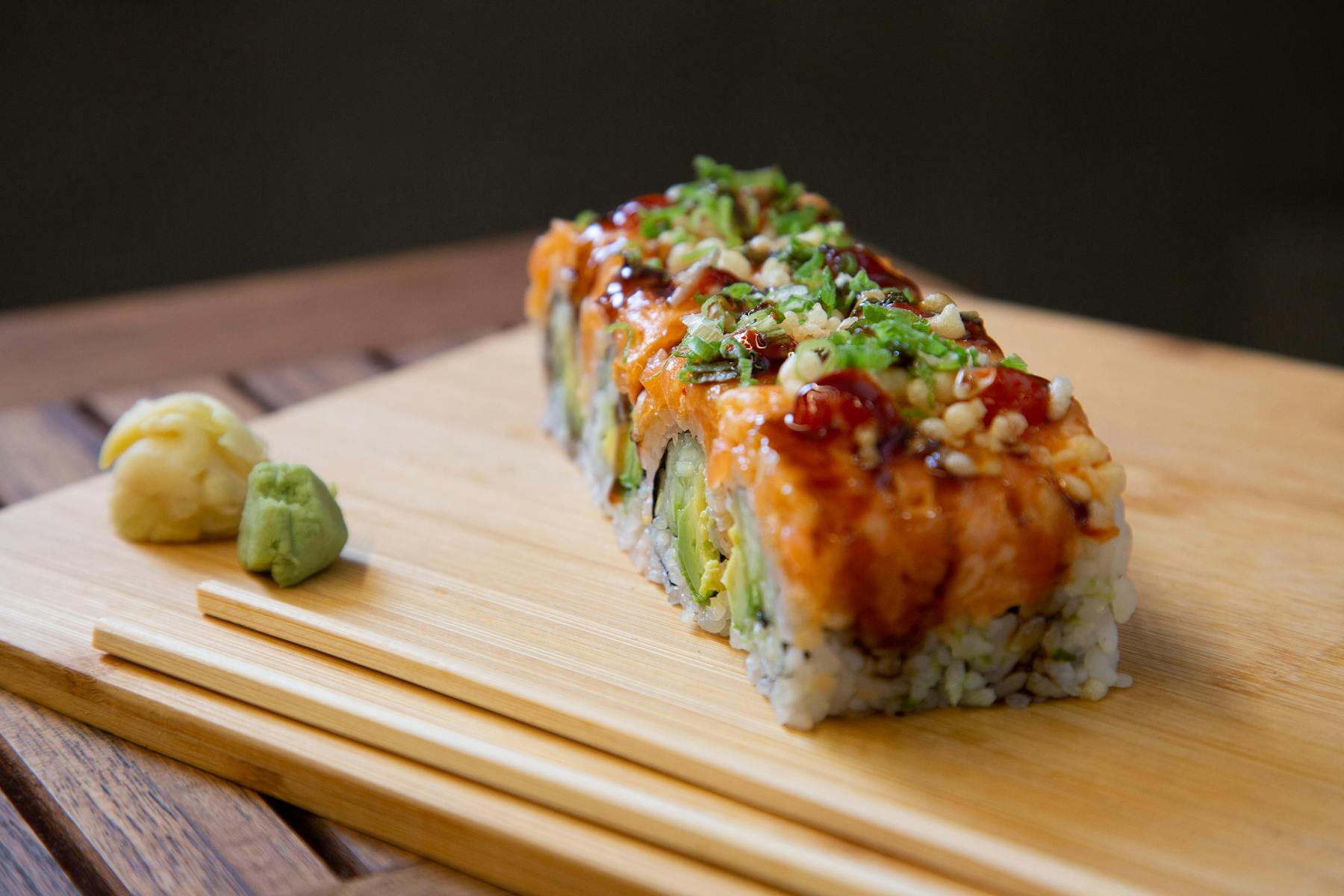 sushi sitting on a wooden table
