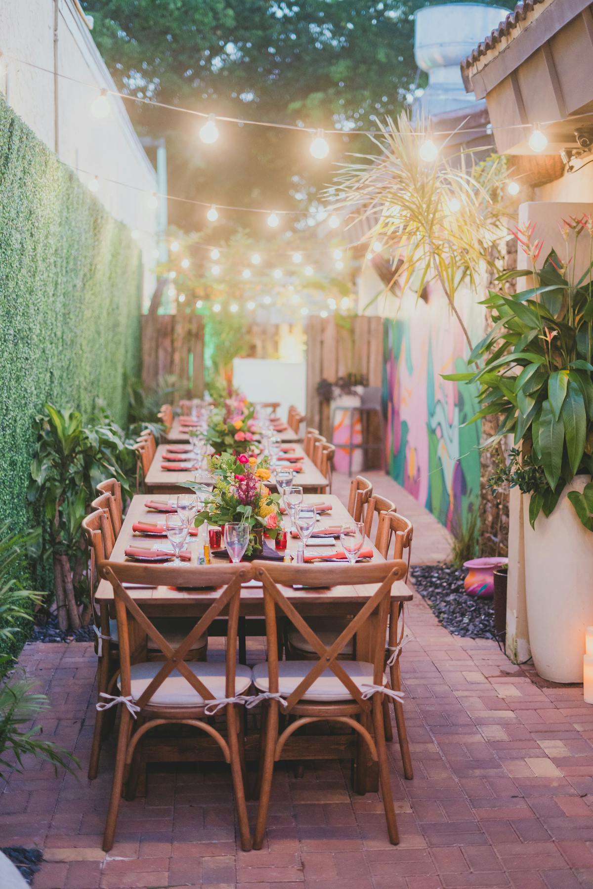 a dining table in a garden