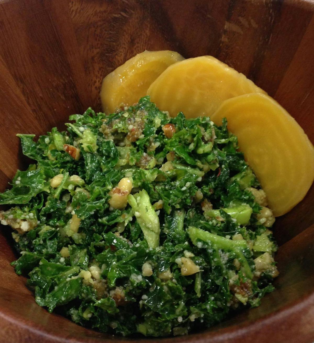 a bowl of food with broccoli