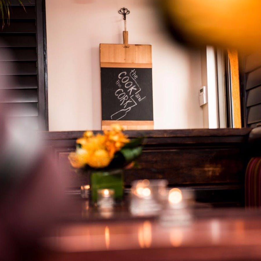 a vase of flowers on a table