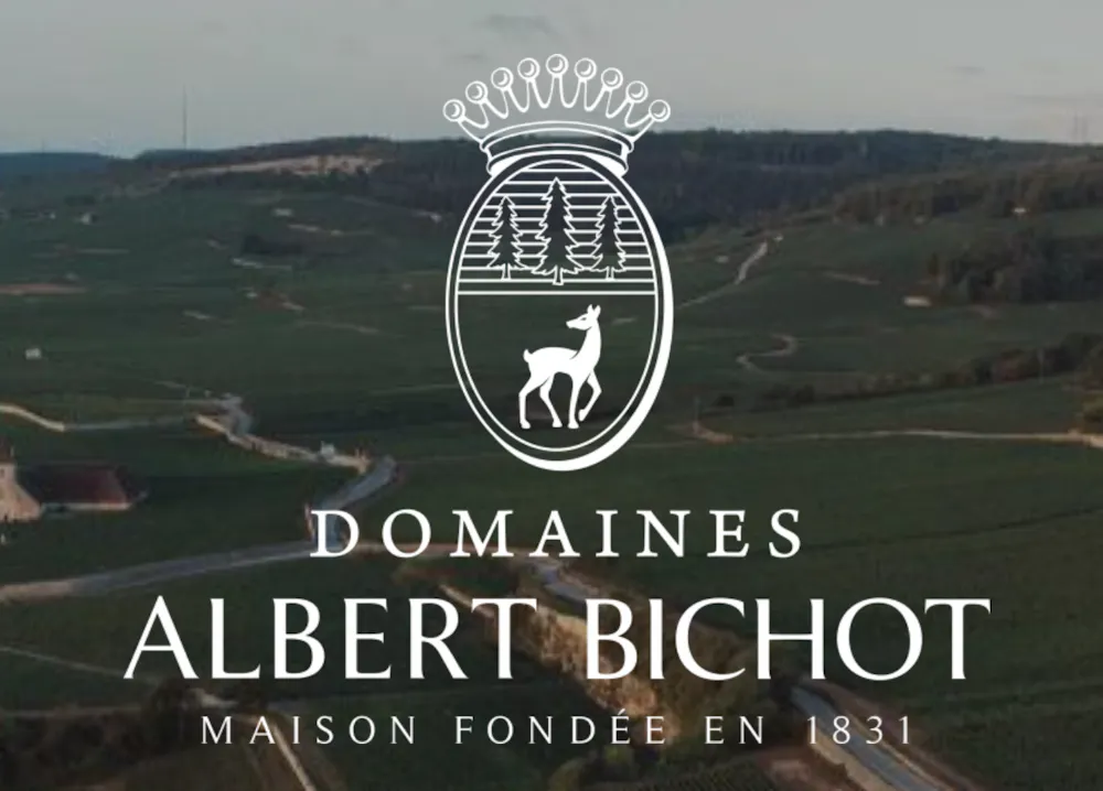 a landscape with a road and a logo