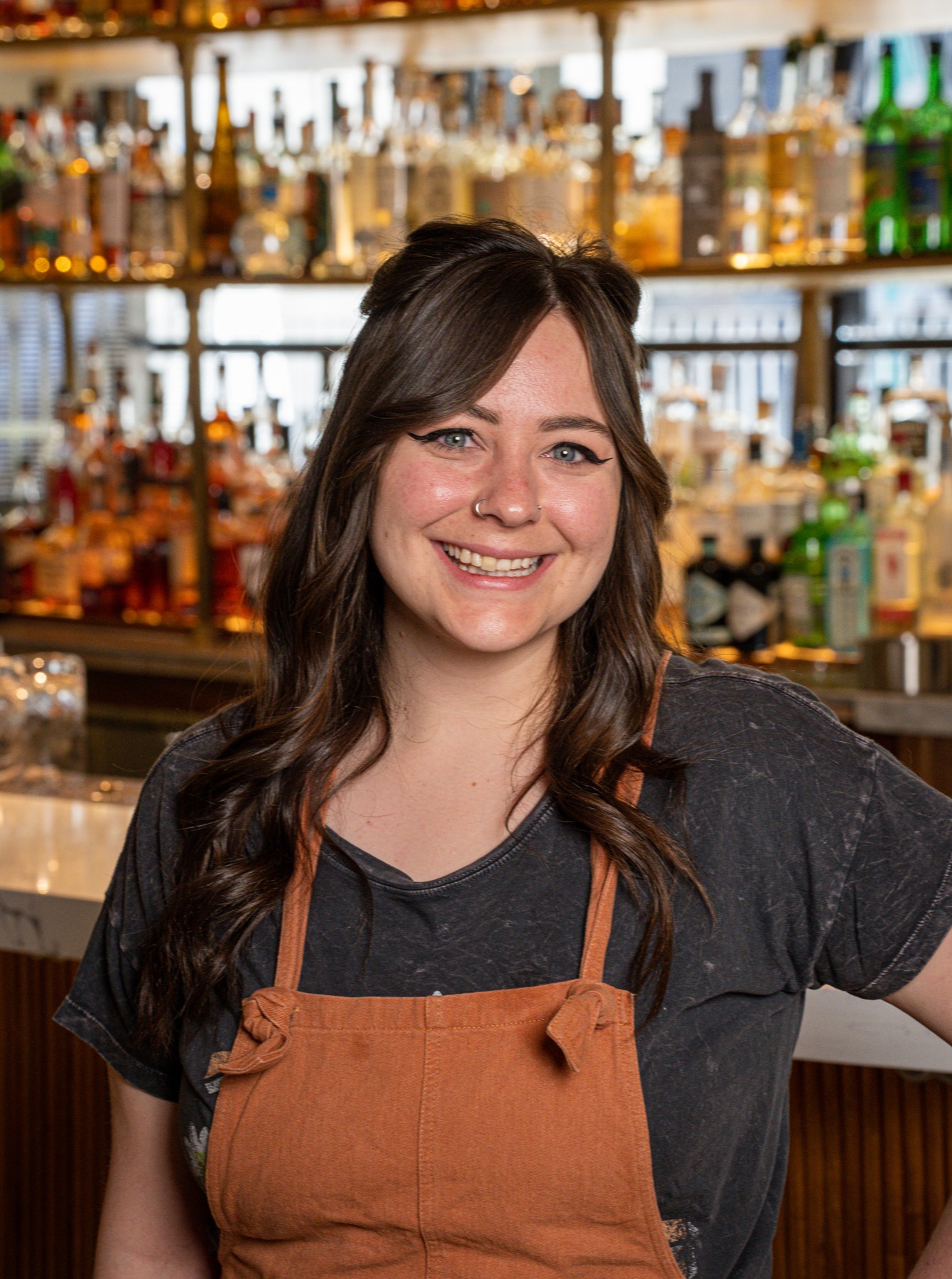 a woman standing in front of a store