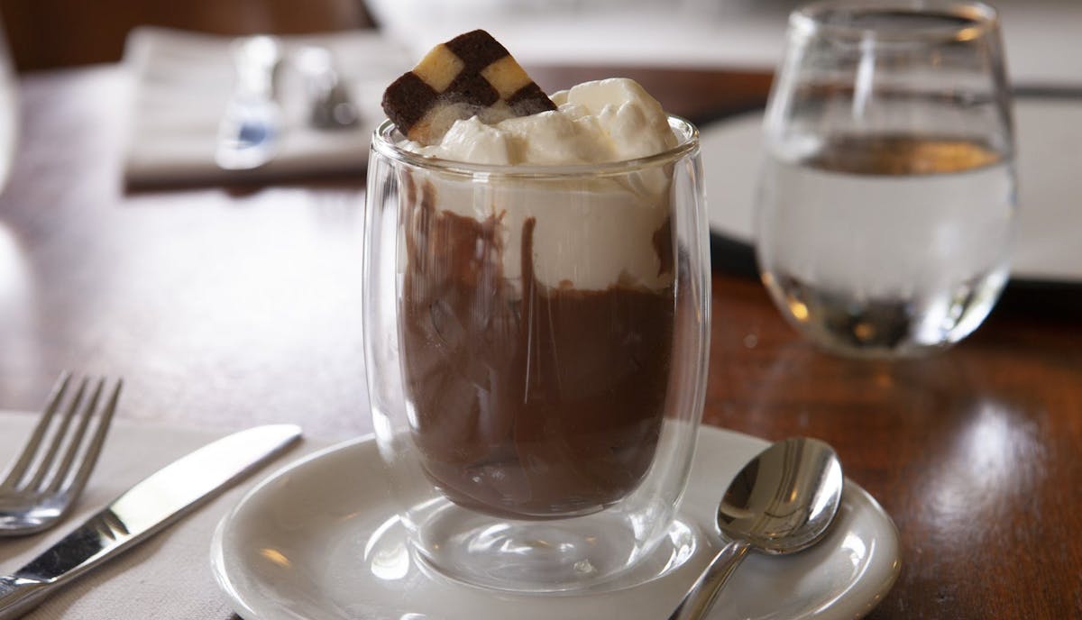 a glass cup on a table