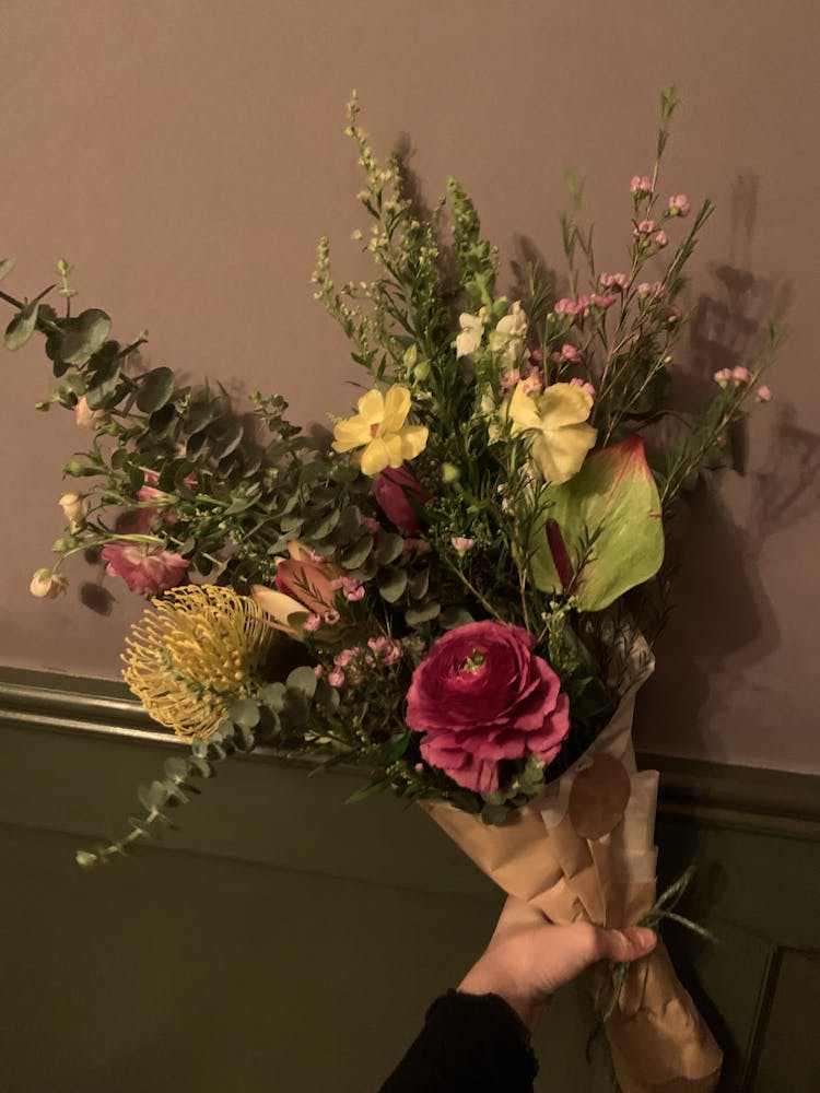 a vase of flowers on a table