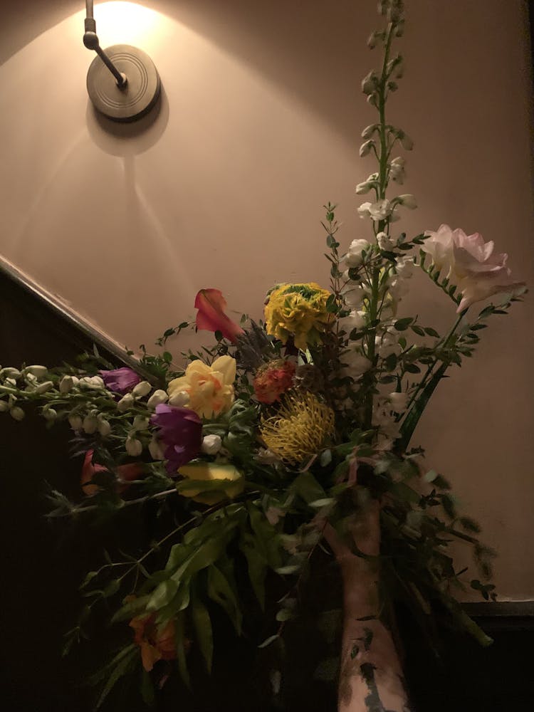 a vase of flowers on a table