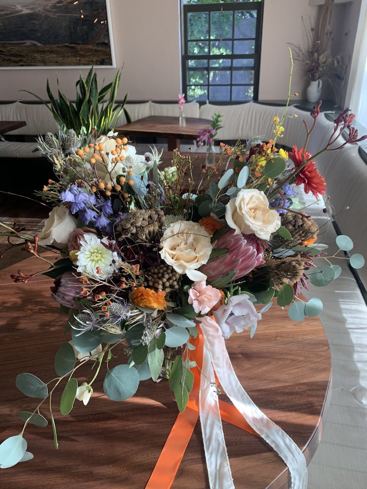 a vase of flowers on a table