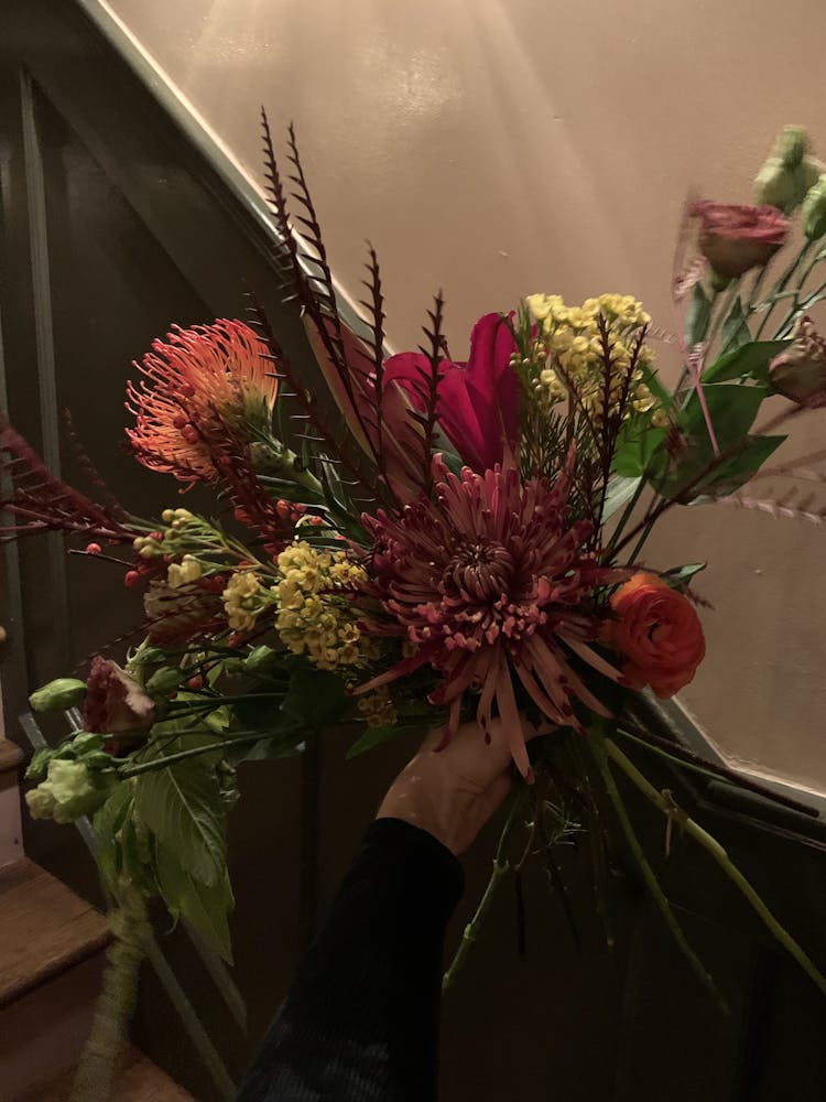 a vase of flowers on a table