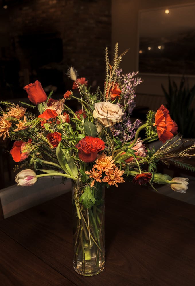 a vase of flowers on a table