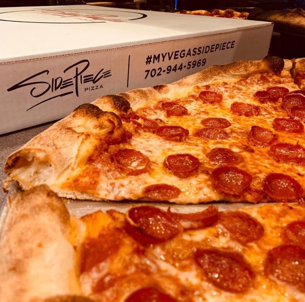 pizza that is delivered fresh and hot from side piece pizza