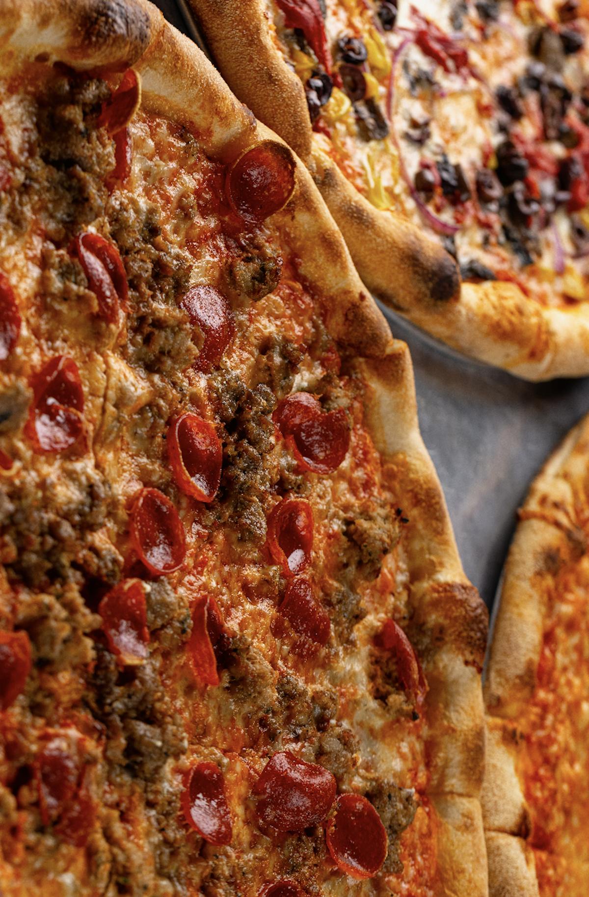 a close up of a slice of pizza