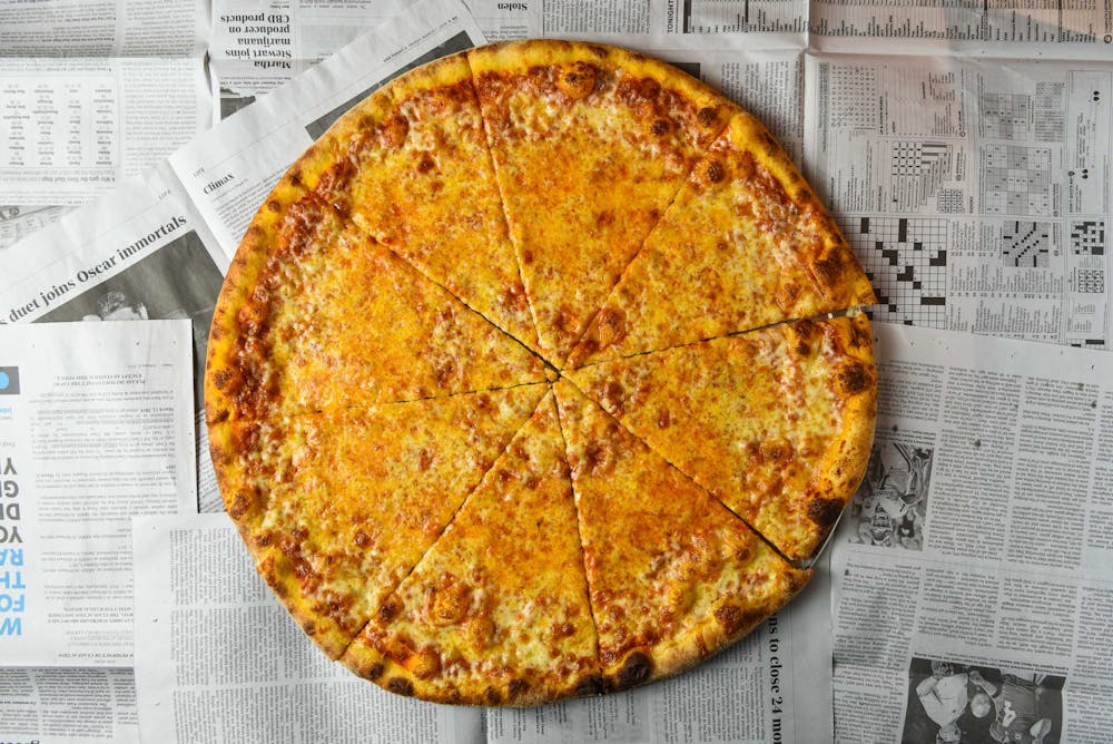 cheese pizza at side piece