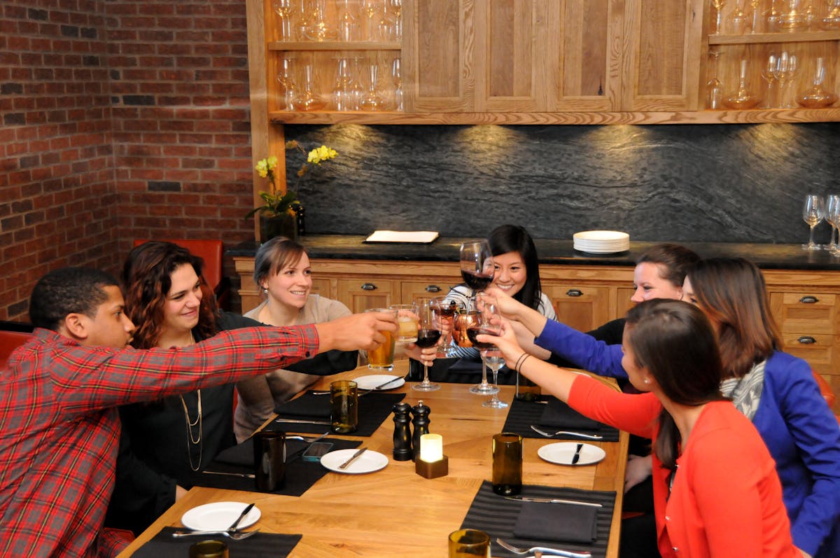 a group of people sitting at a table