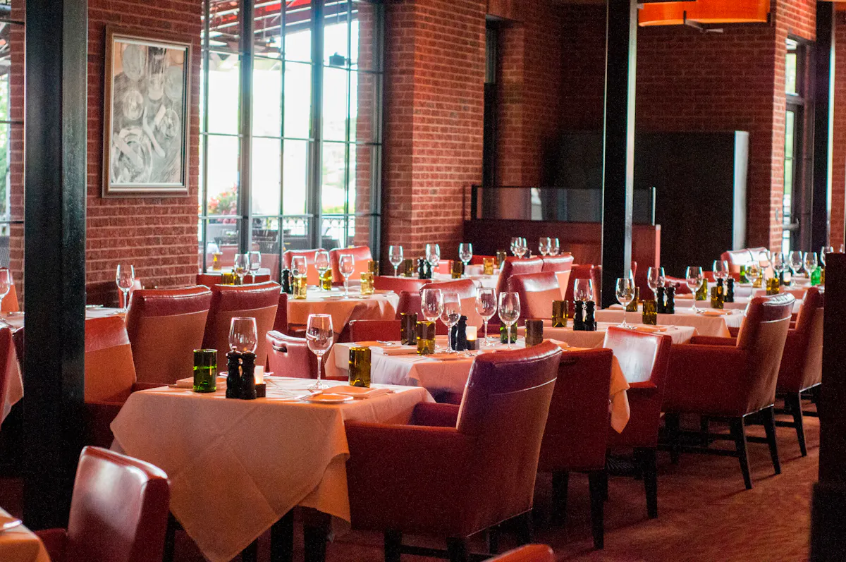 seats for two persons and the table set