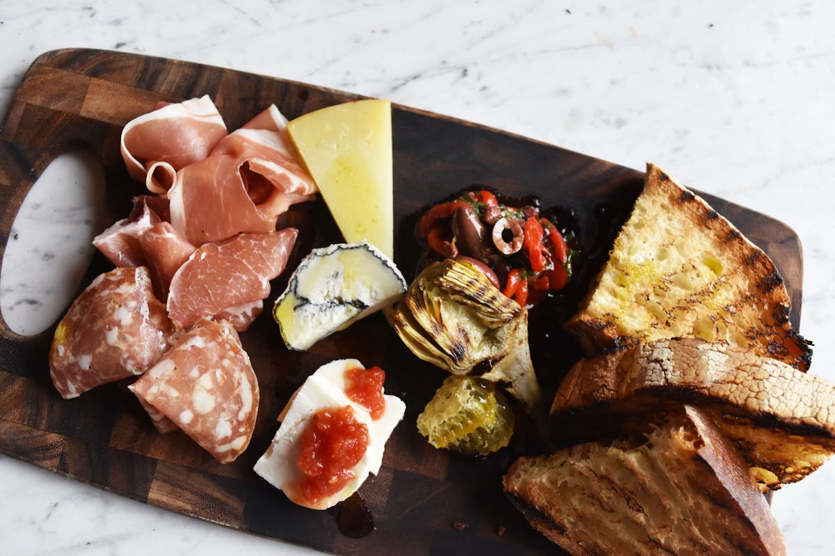 a plate of food with a slice cut out
