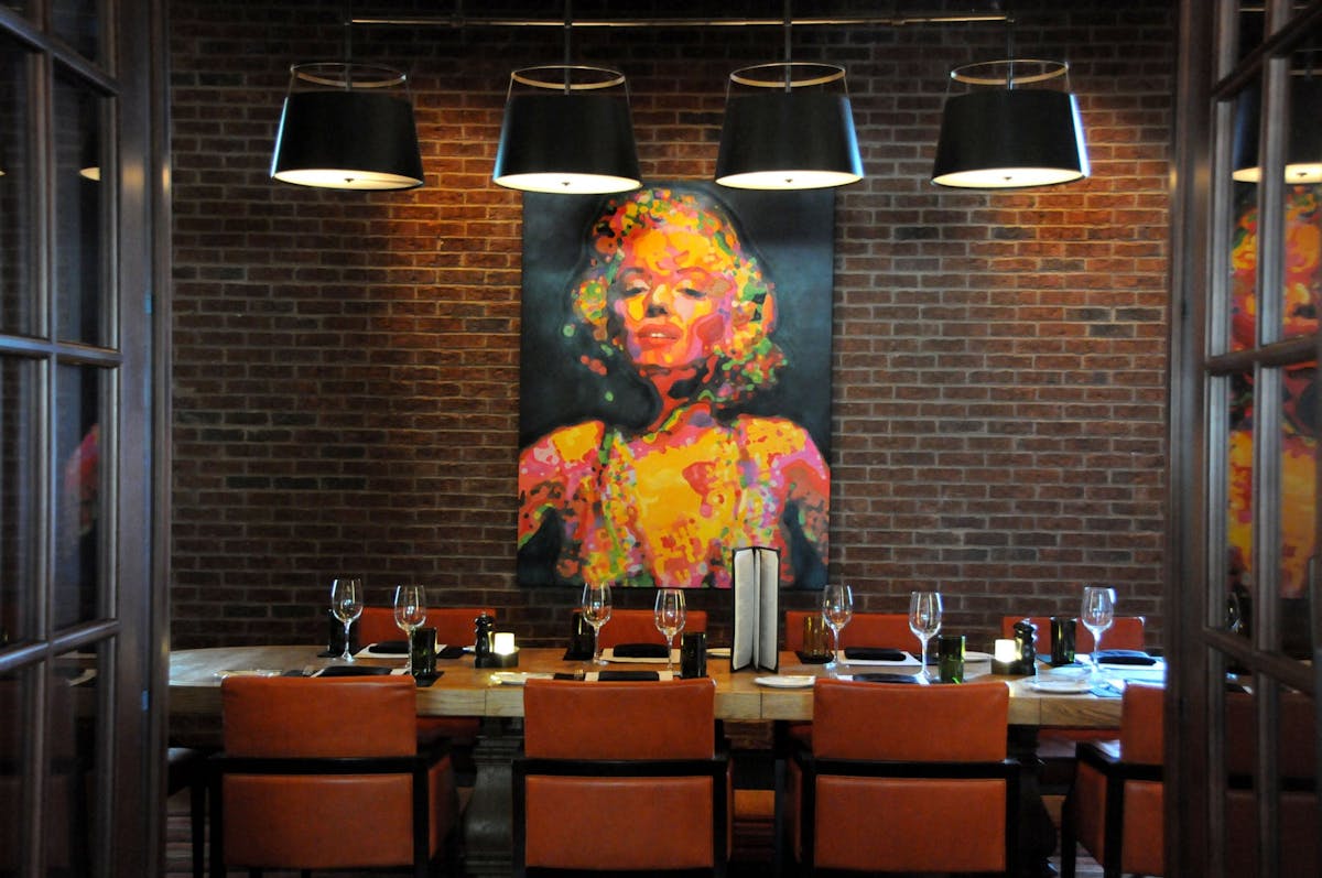 restaurant wall with a painting 