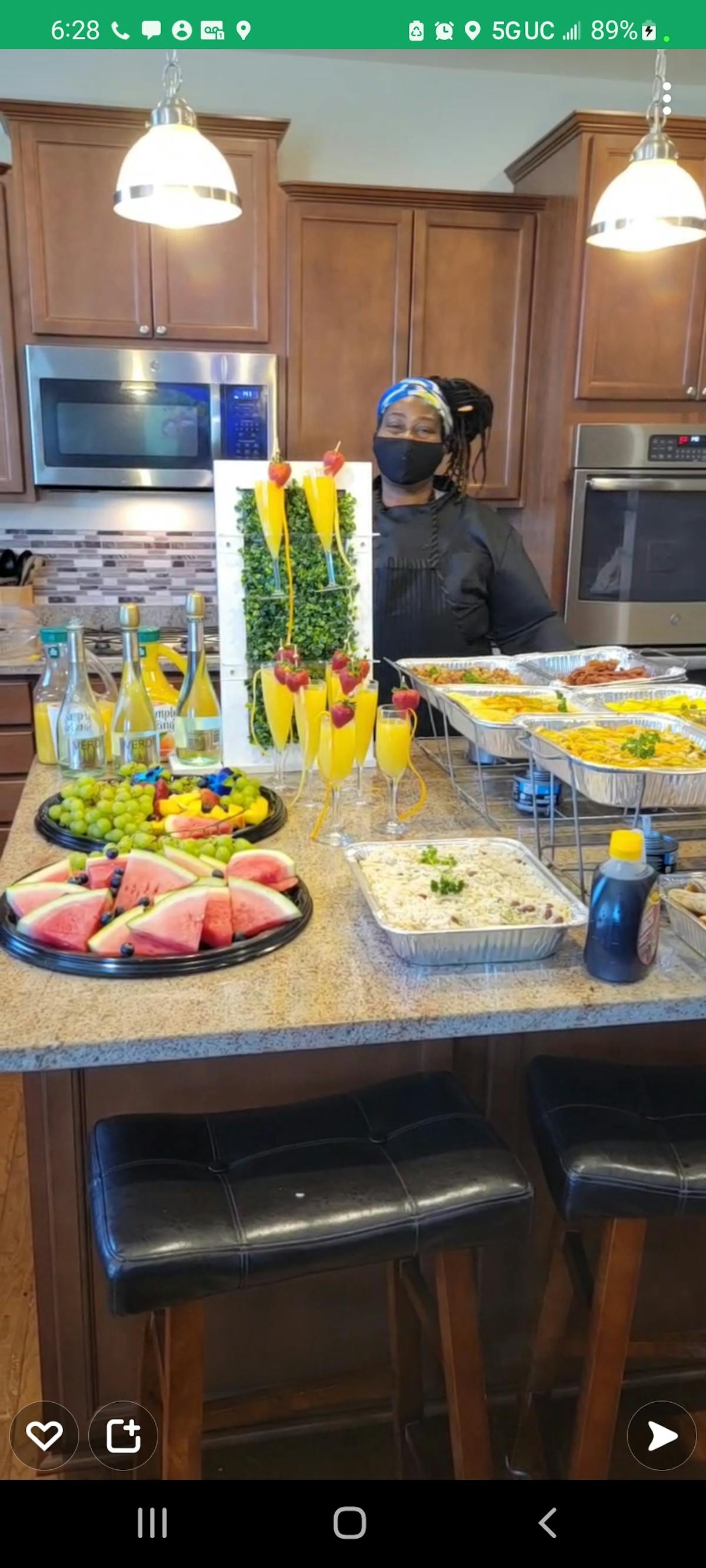 a vase of flowers on a kitchen counter