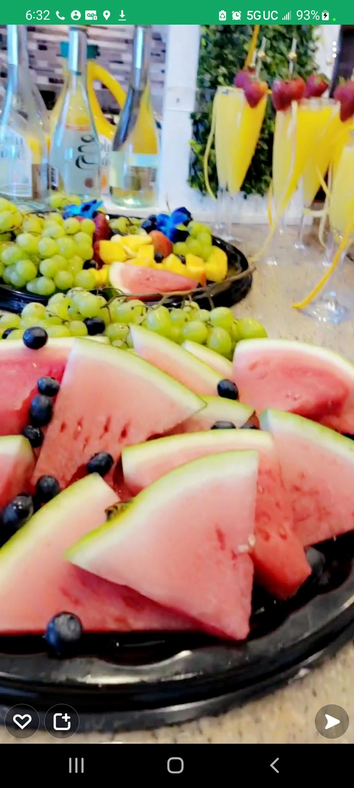 a cake with fruit on top of a table