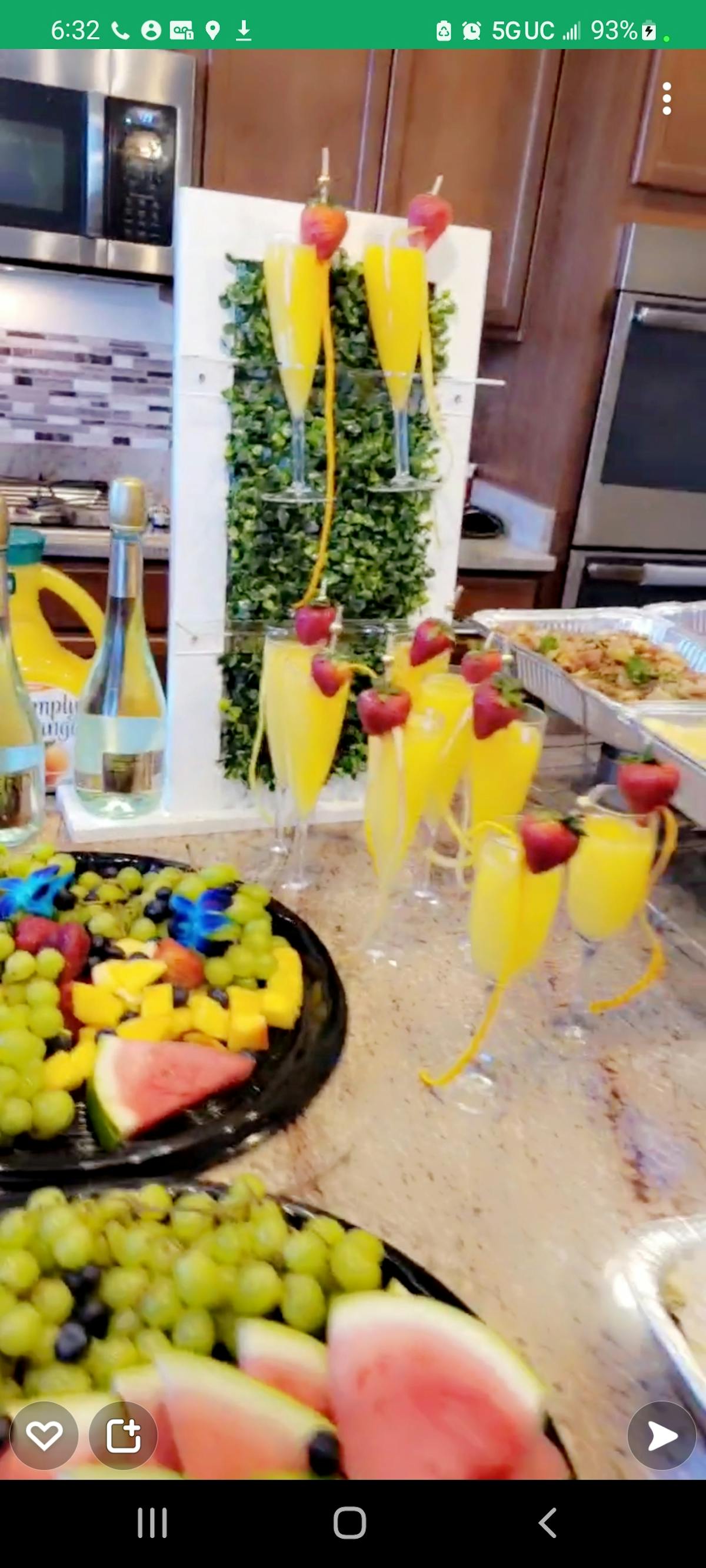 a bowl of fruit on a kitchen counter