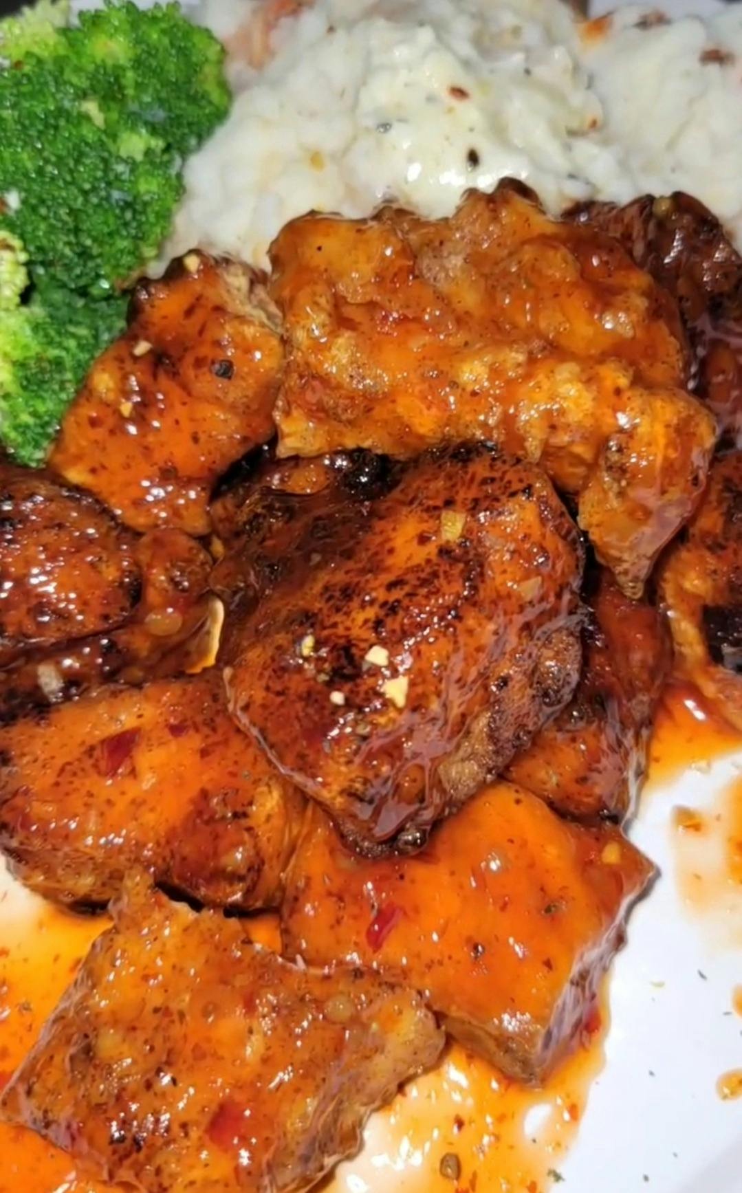 a plate of food with meat and vegetables