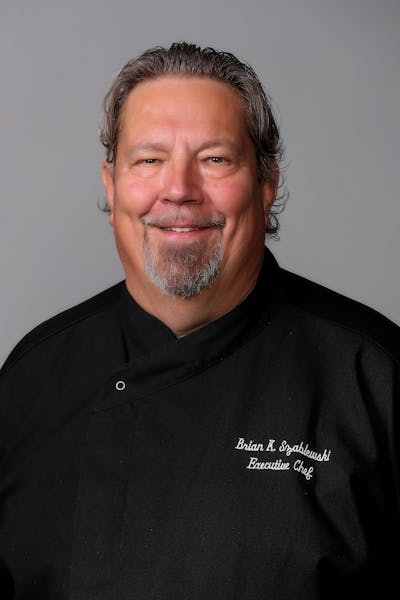 a man wearing a black shirt