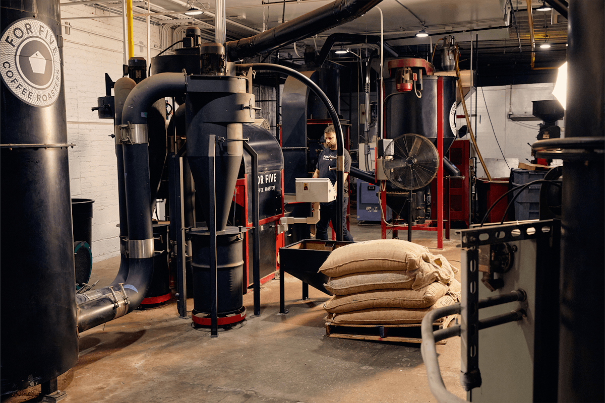 coffee machines and stack of bags