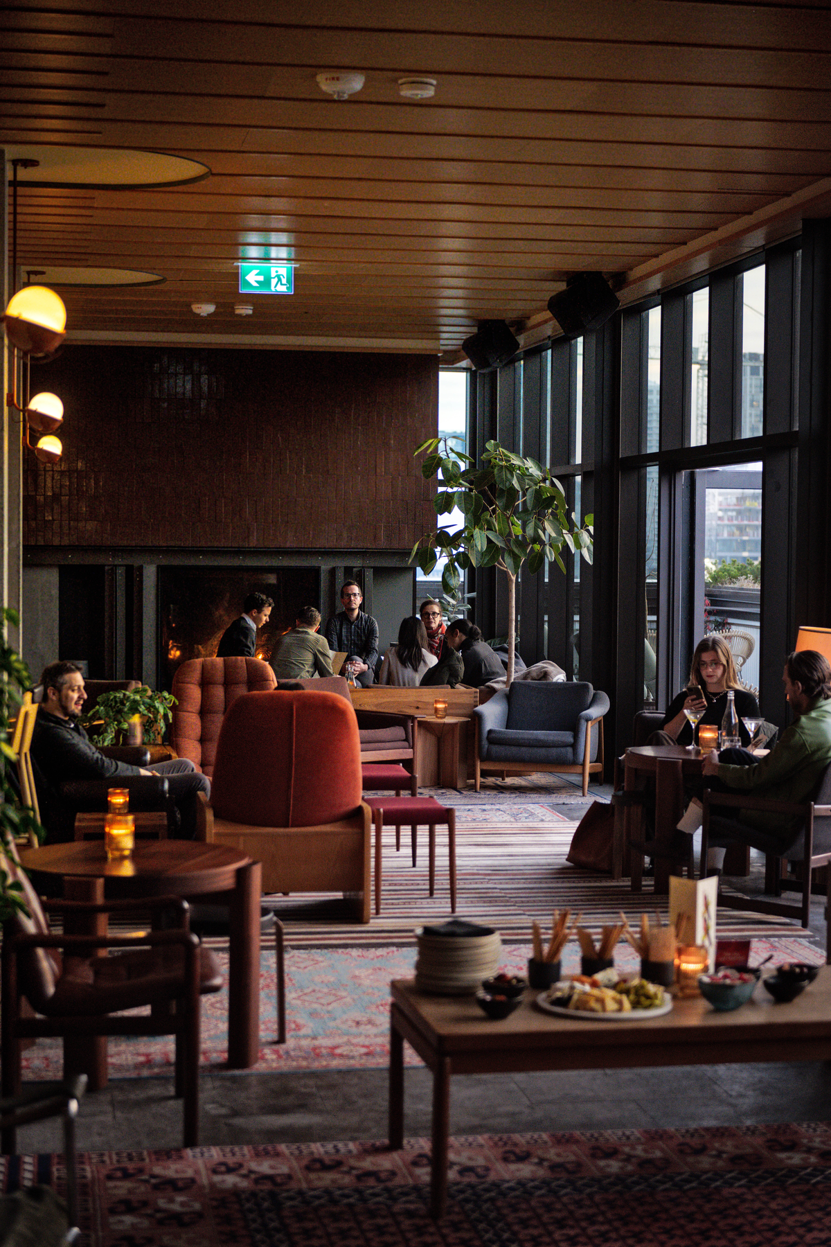 a living room filled with furniture and a large window