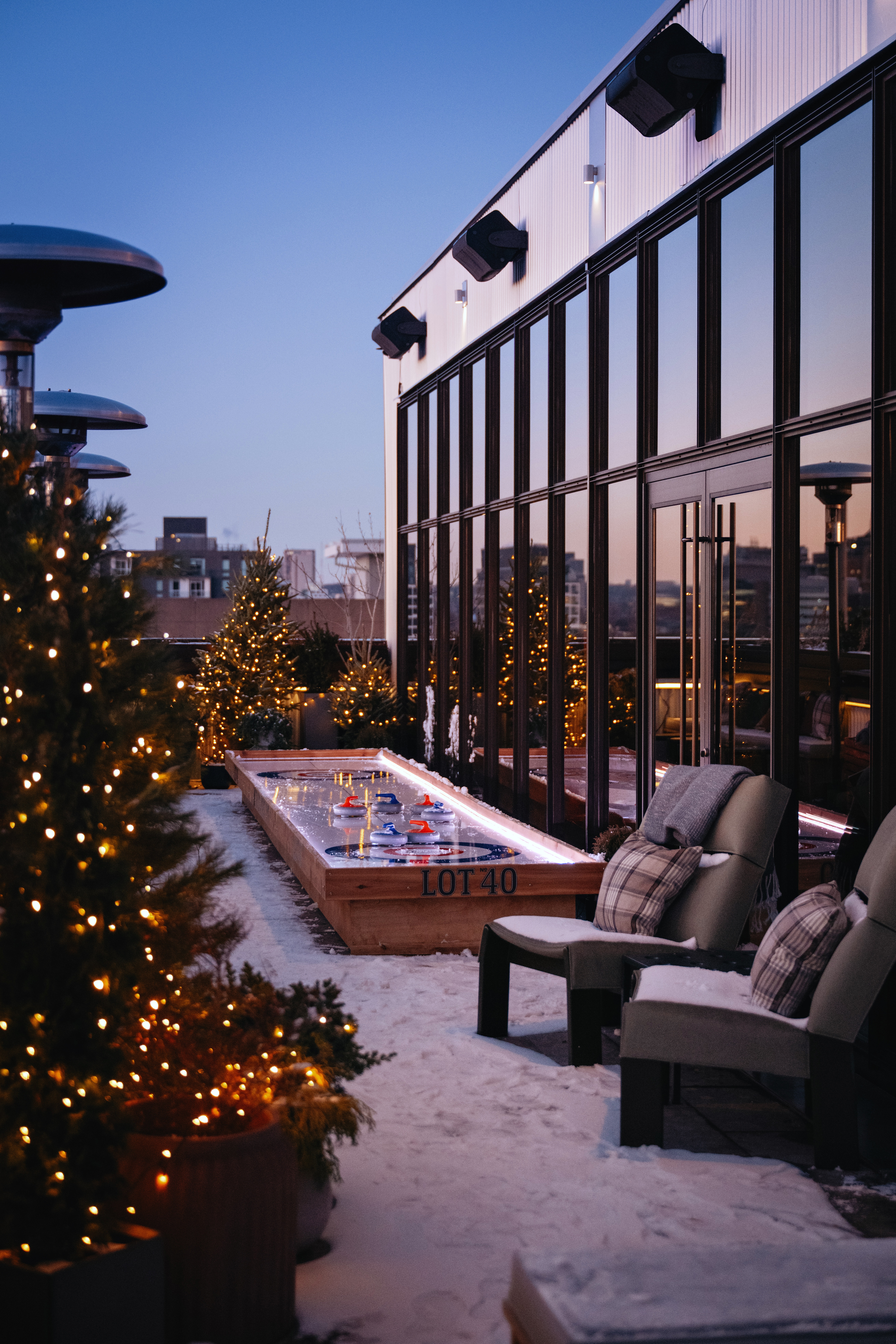 a living area with a building in the background