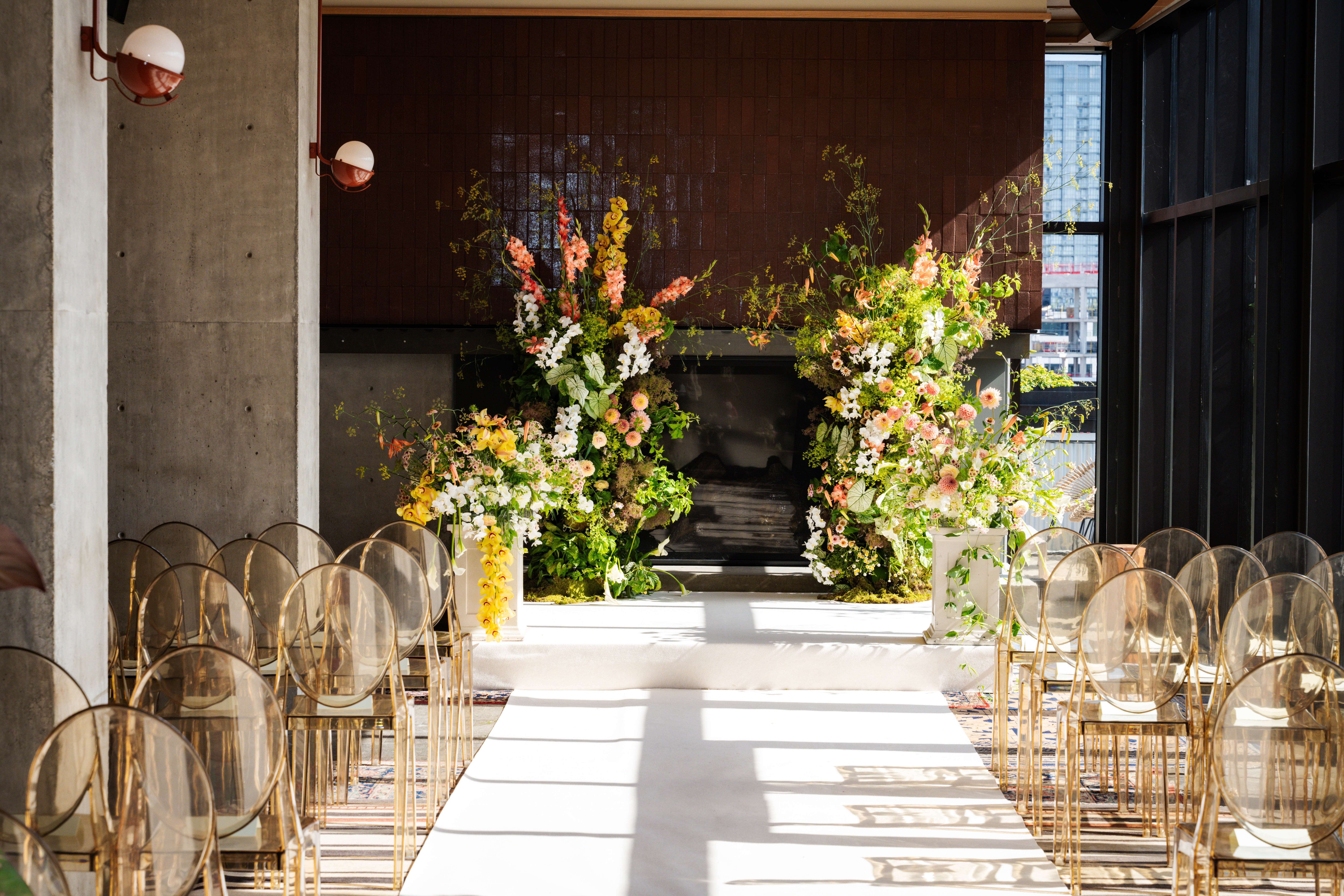 a vase of flowers sitting on top of a building