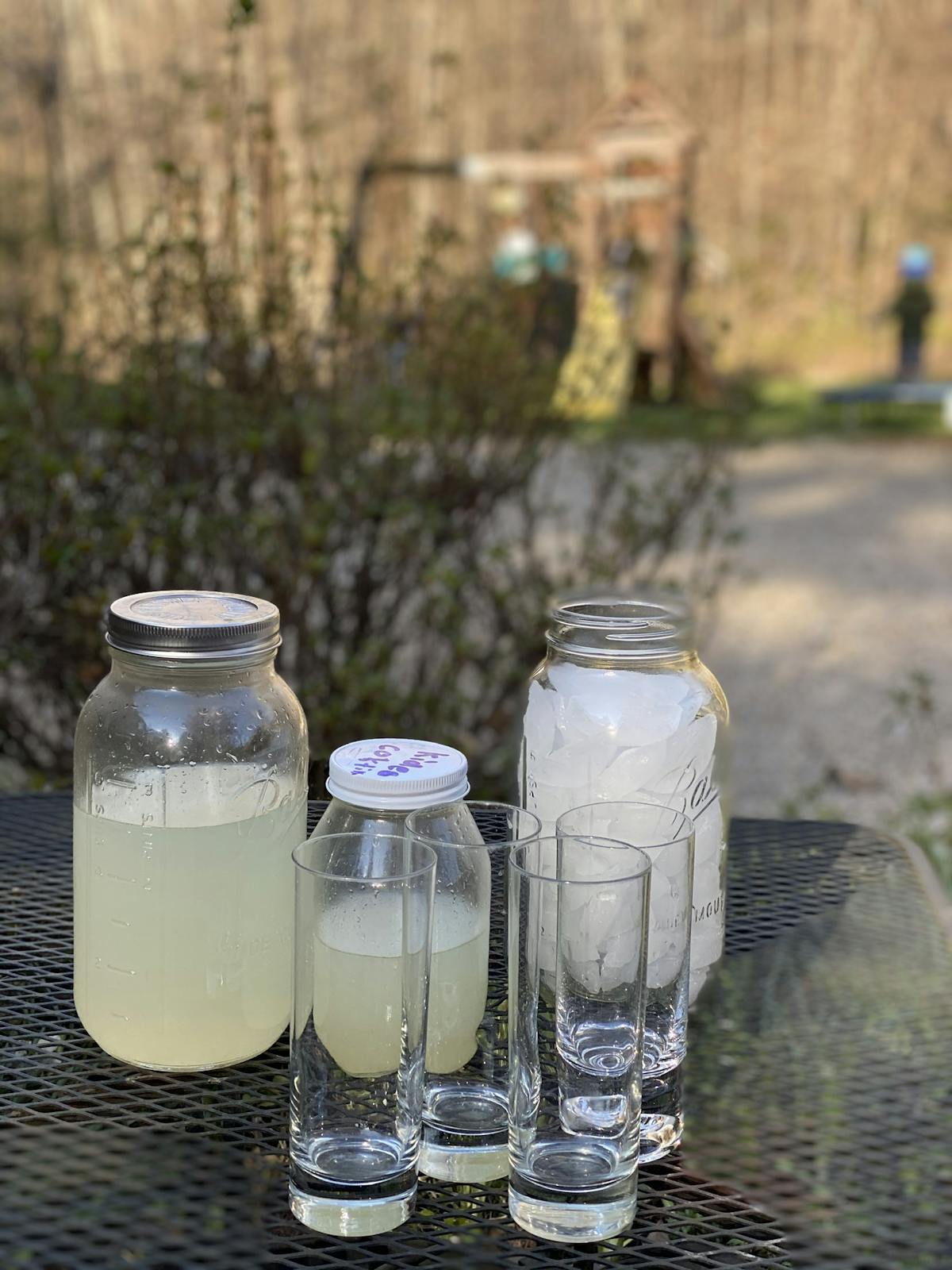 a group of glass bottles on a table