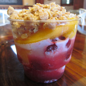 a dessert in a glass cup on a table