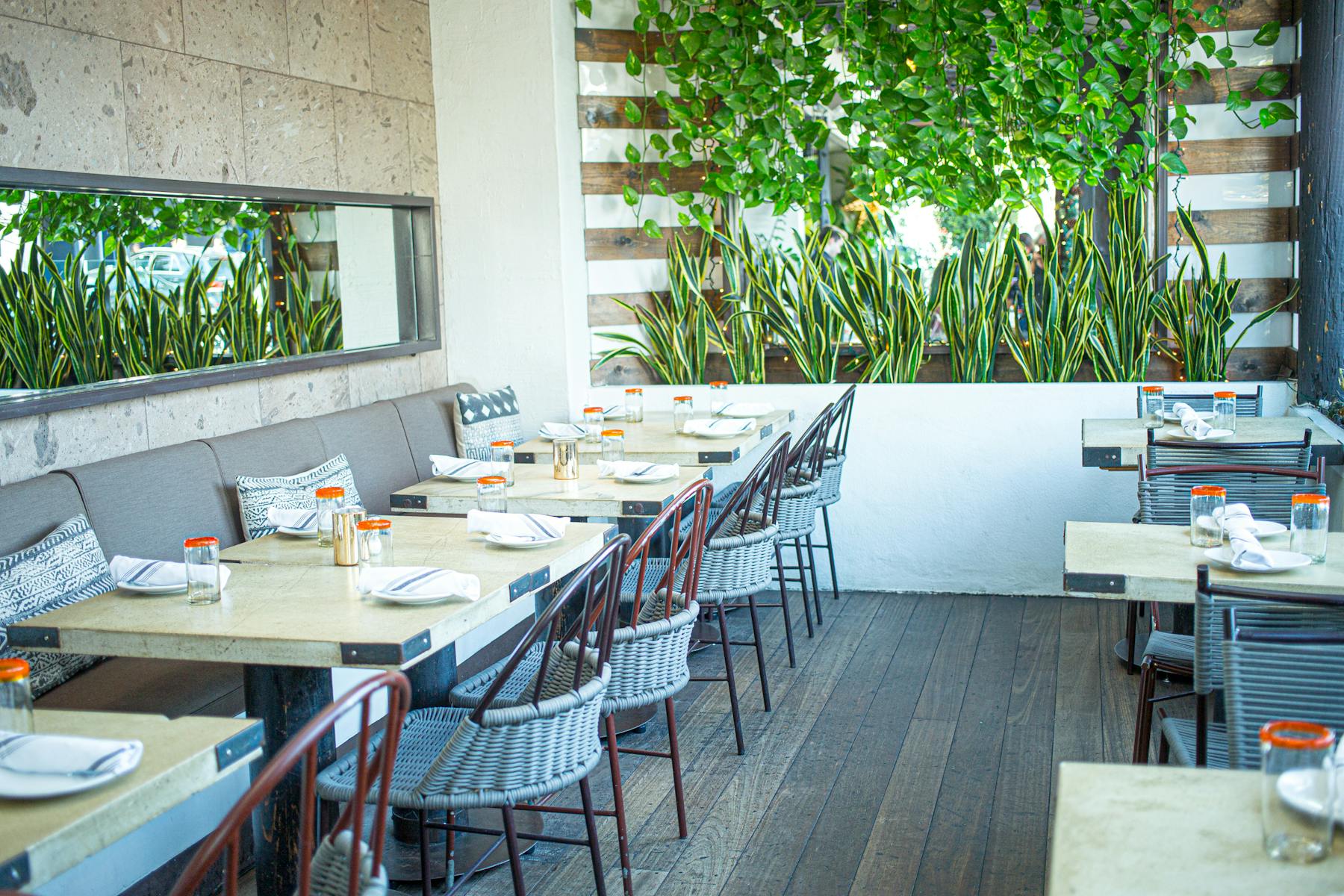 a dining room table in front of a building