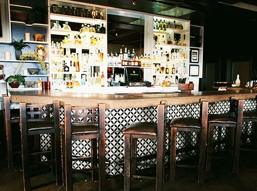 a kitchen with a table in a restaurant
