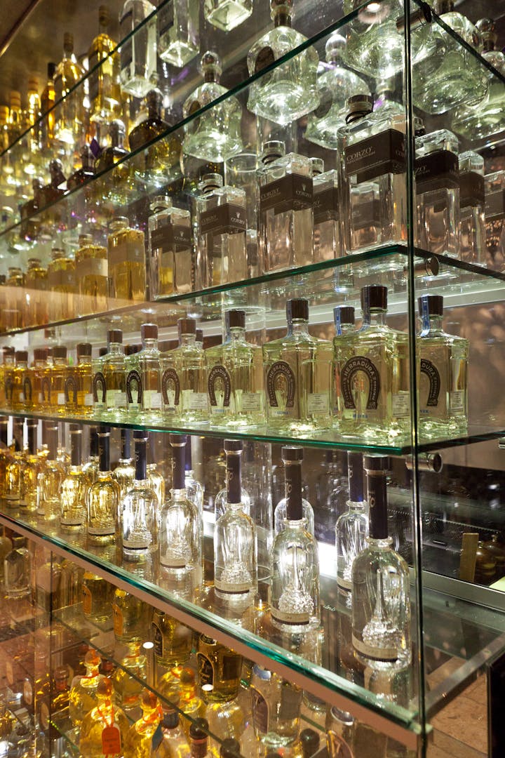a store shelf filled with wine glasses