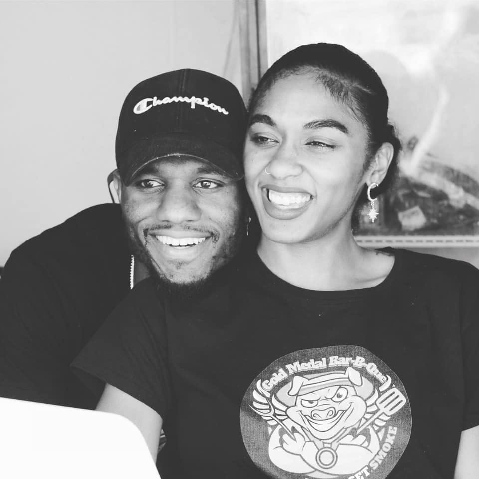 a man and woman posing for a photo