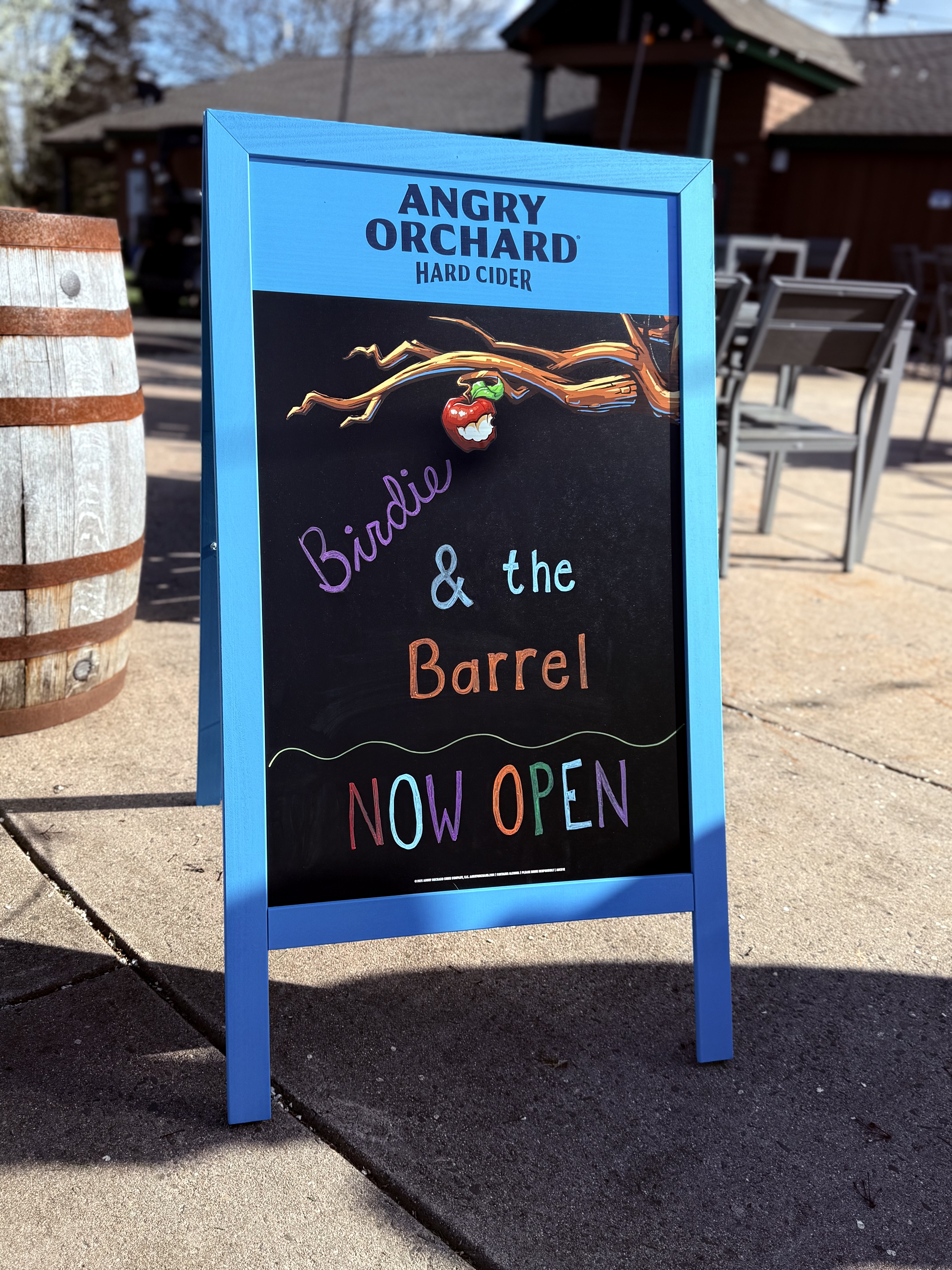 a sign on a sidewalk