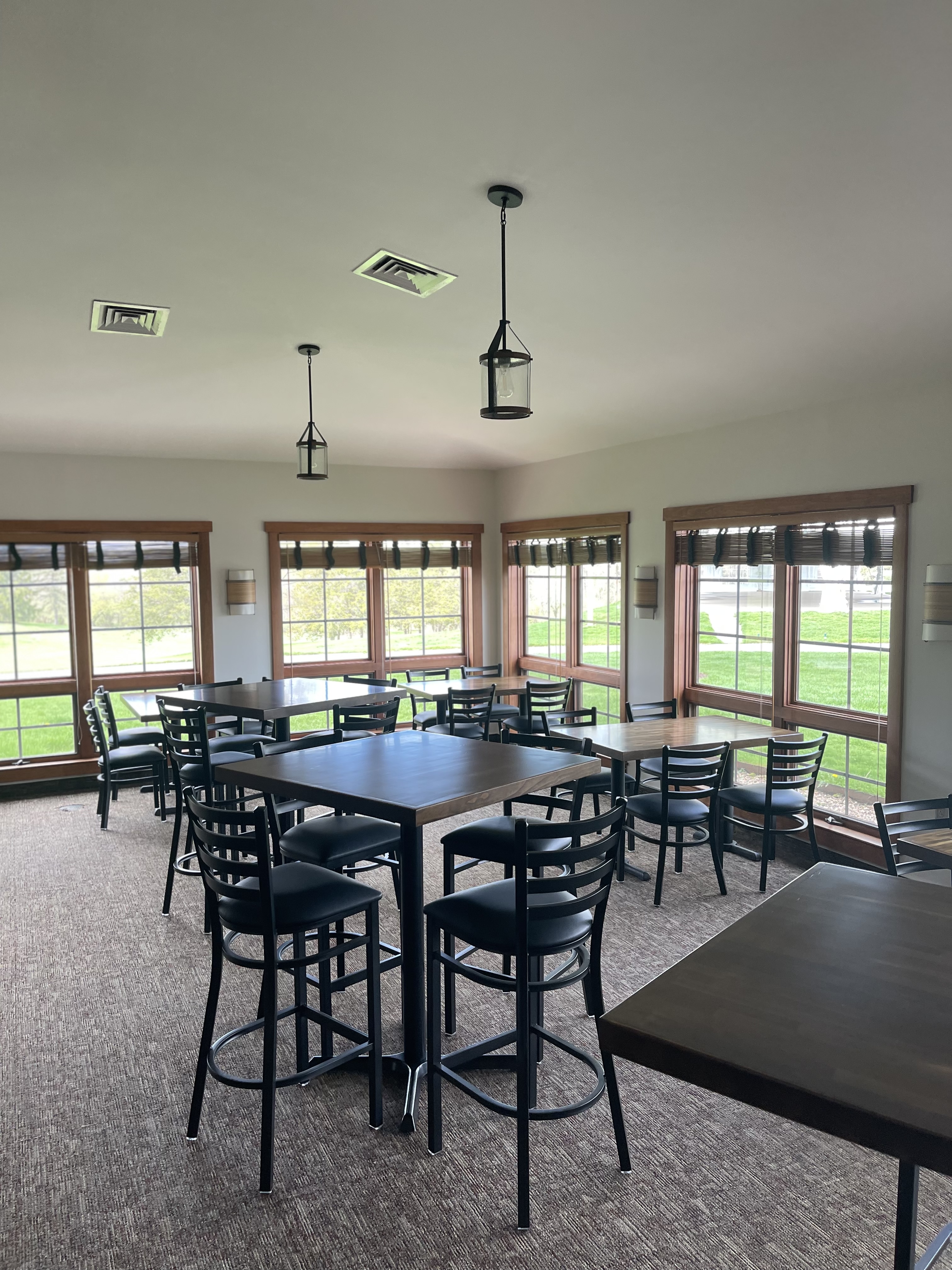 a room with tables and chairs