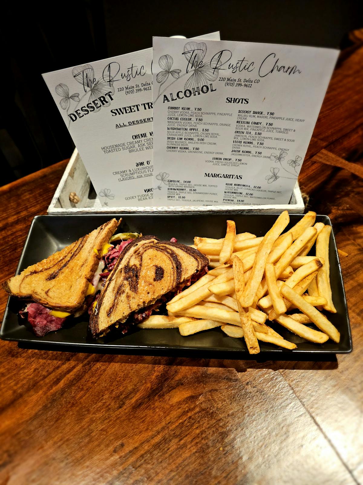 a sandwich and fries on a table